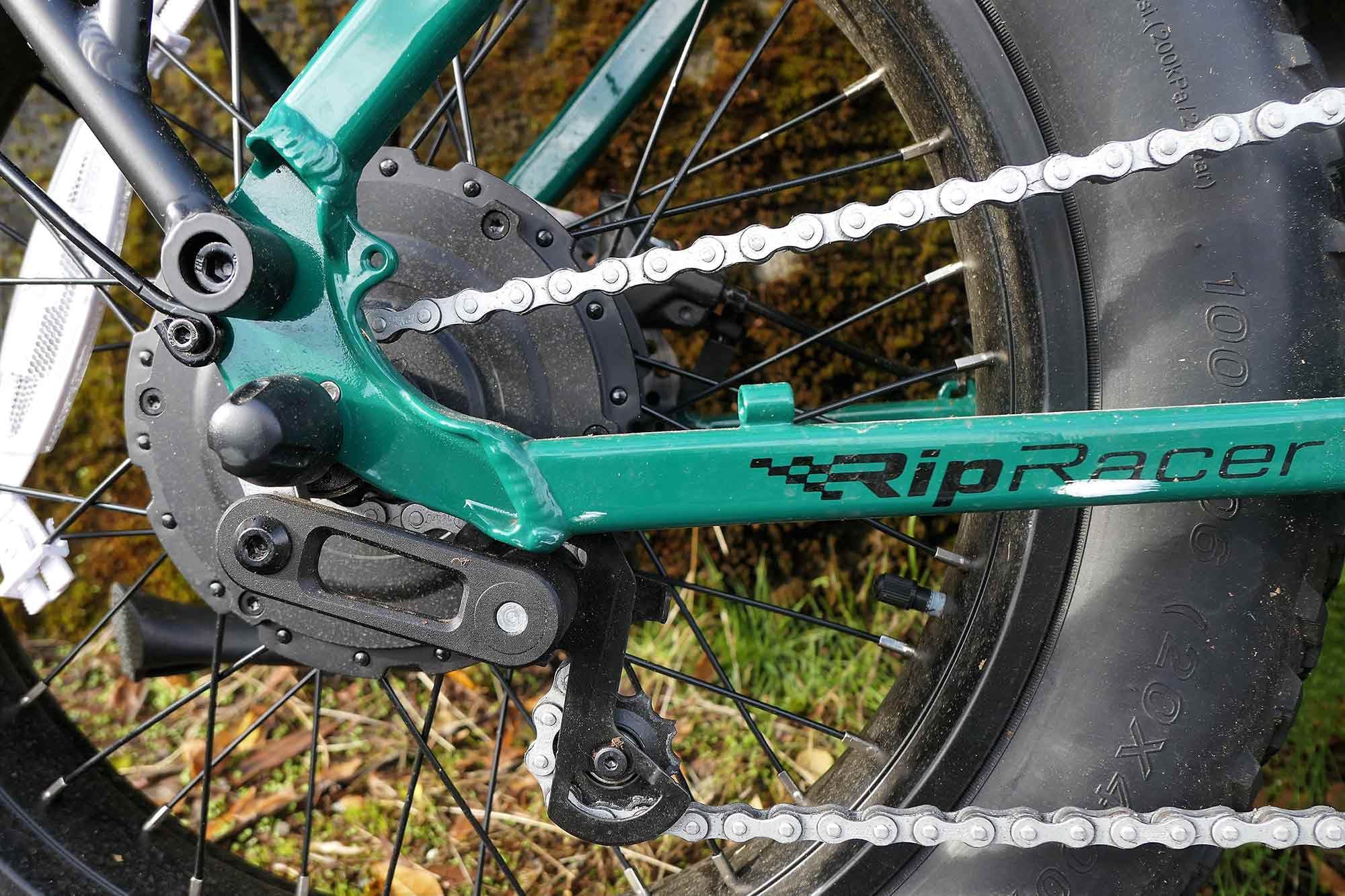 That’s a chain tensioner, not a derailleur, in the singlespeed drivetrain.